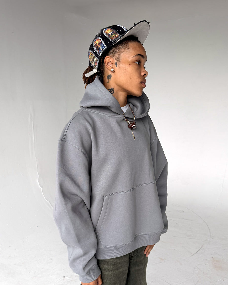 Brooklyn Classic pullover hoodie in Grey, three-quarter view, on a model