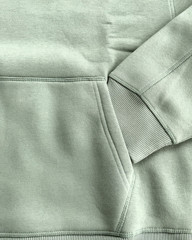 Brooklyn Classic pullover hoodie in Sage, close-up of the cuff, pocket and hem