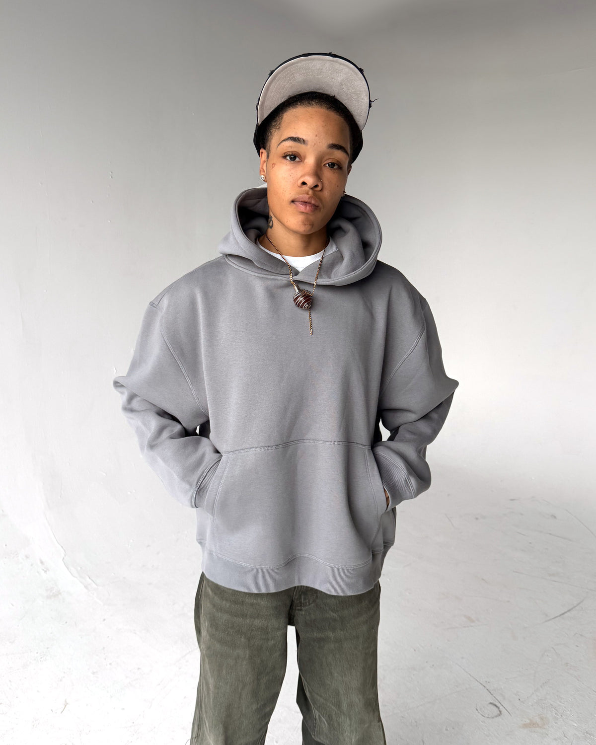 Brooklyn Classic pullover hoodie in Grey, front, on a model