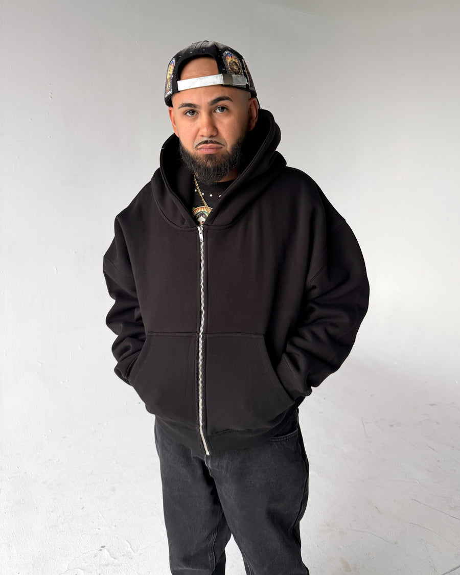 Oversized Crop Zip hoodie in Black, front, on a model