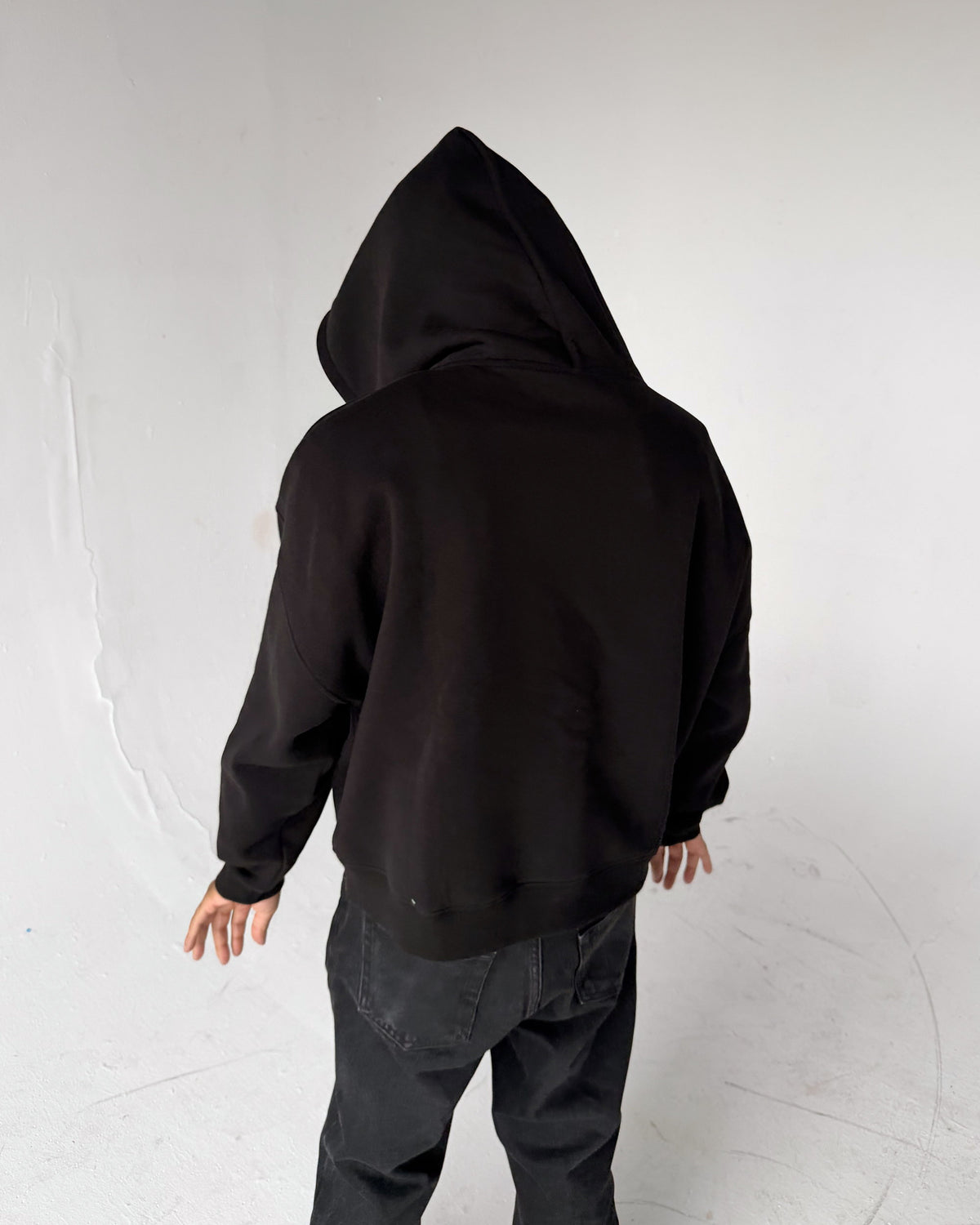 Oversized Crop Zip hoodie in Black, back, on a model