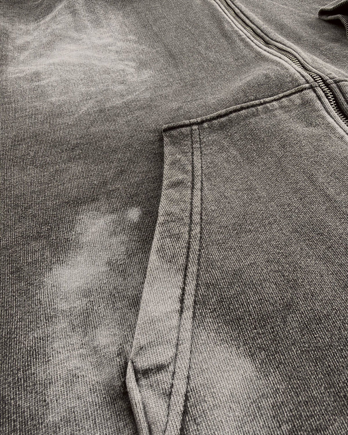 Uptown Crop cropped zip-up hoodie in Acid Wash, close-up of the pocket and French terry