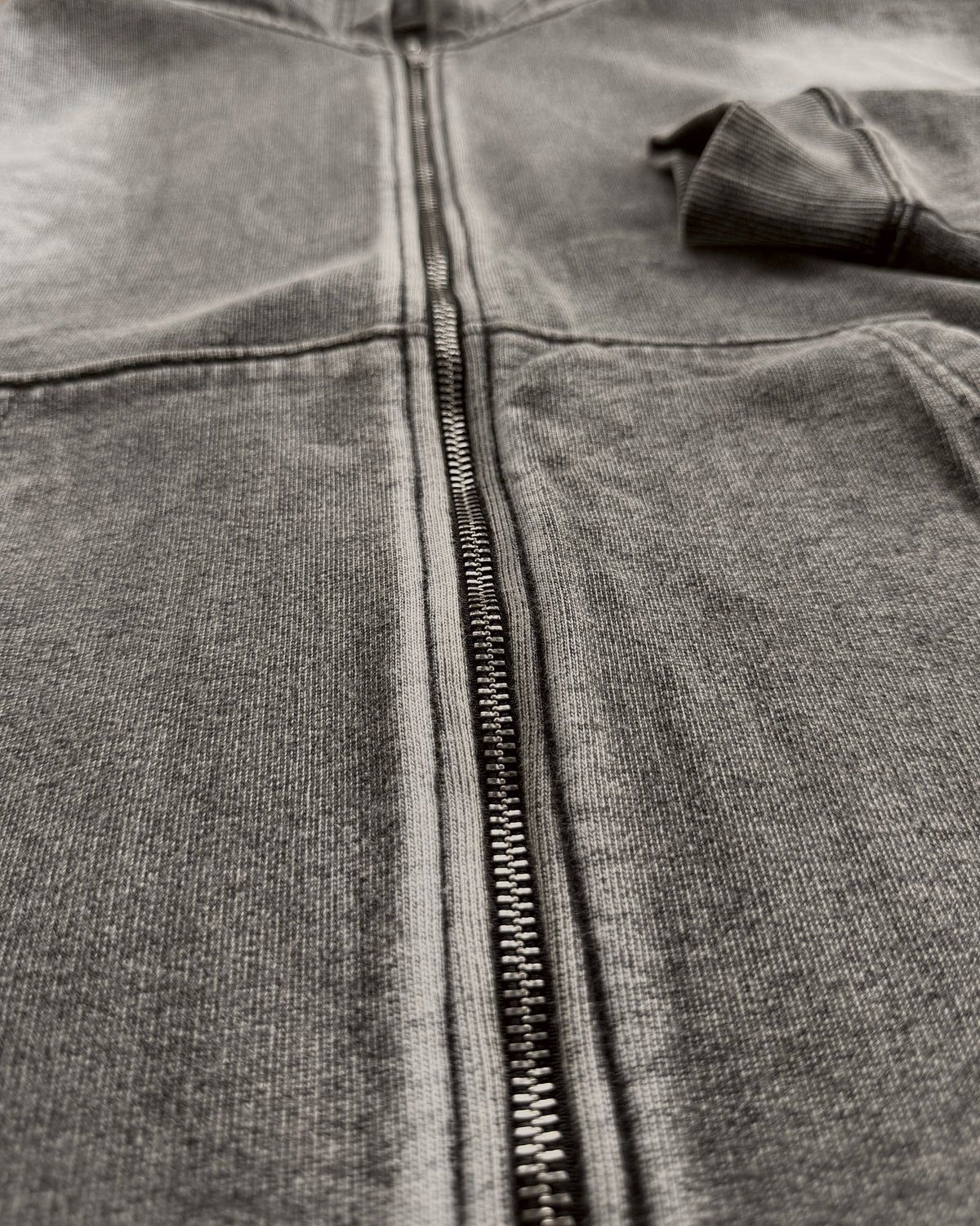 Uptown Crop cropped zip-up hoodie in Acid Wash, close-up of the zip and wash