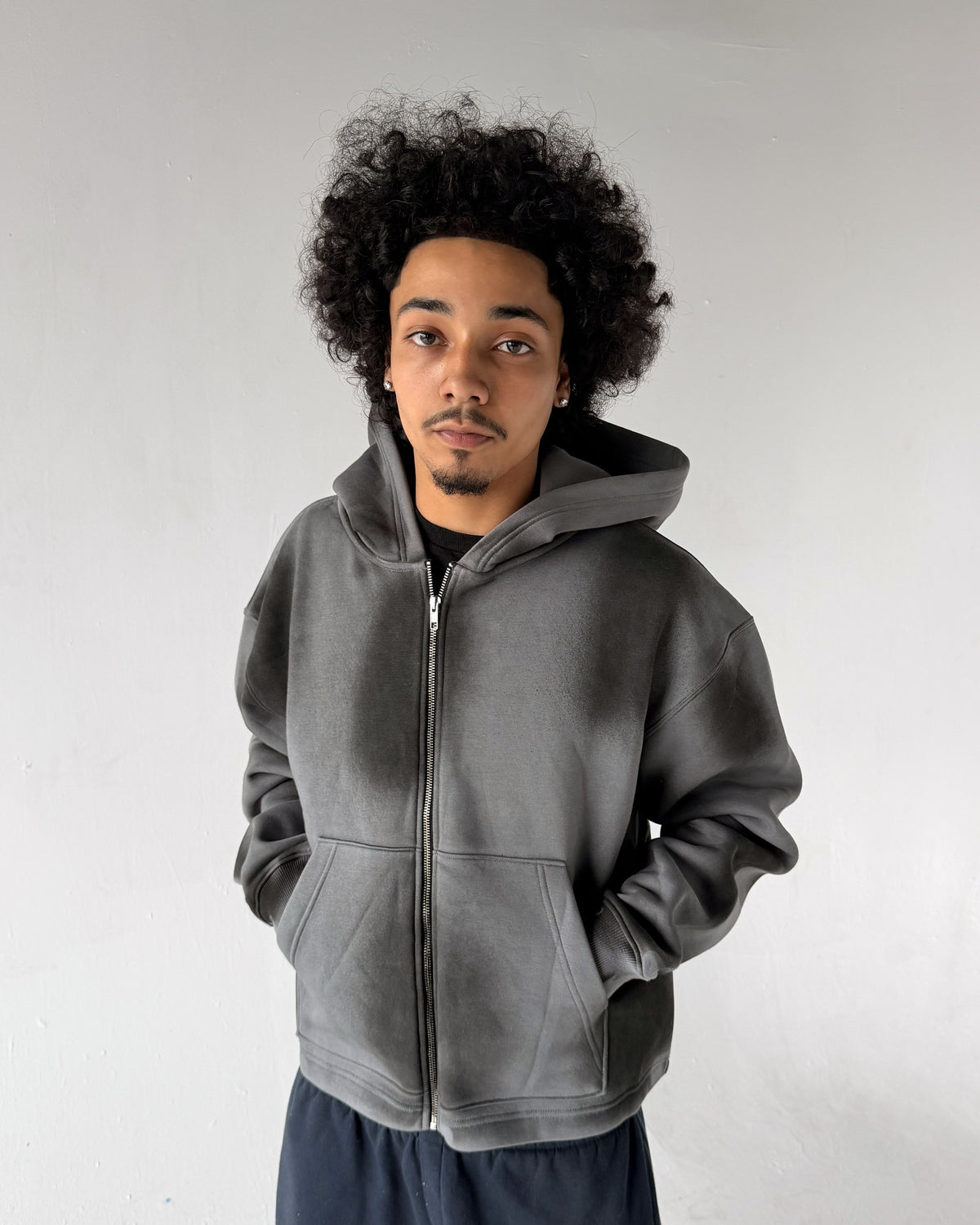 Uptown Crop cropped zip-up hoodie in Washed Grey, front, on a model